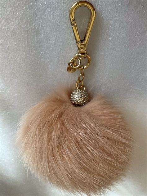 michael kors keychain bag|Michael Kors fox fur keychain.